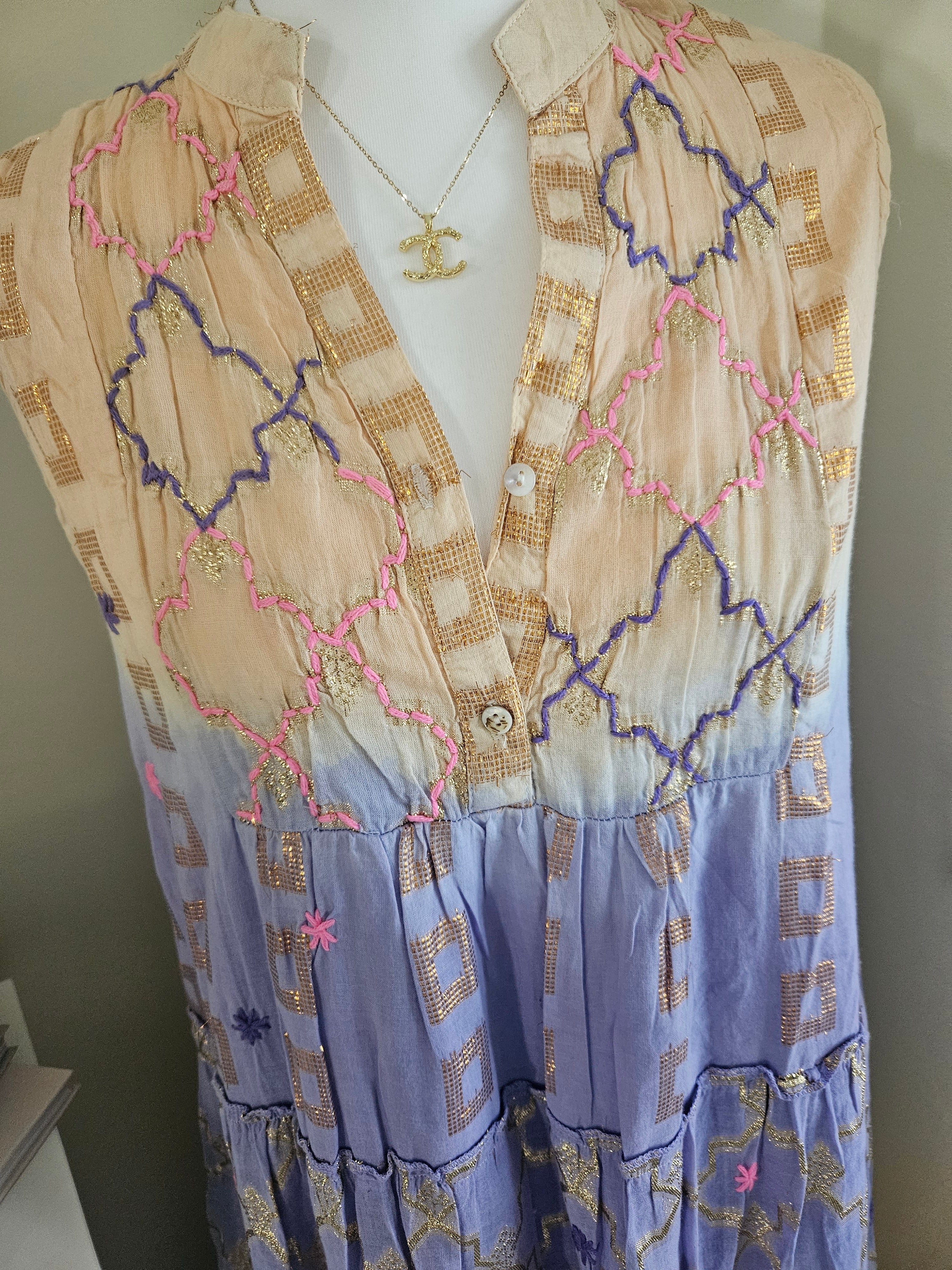 Madinat dress in Lilac and apricot
