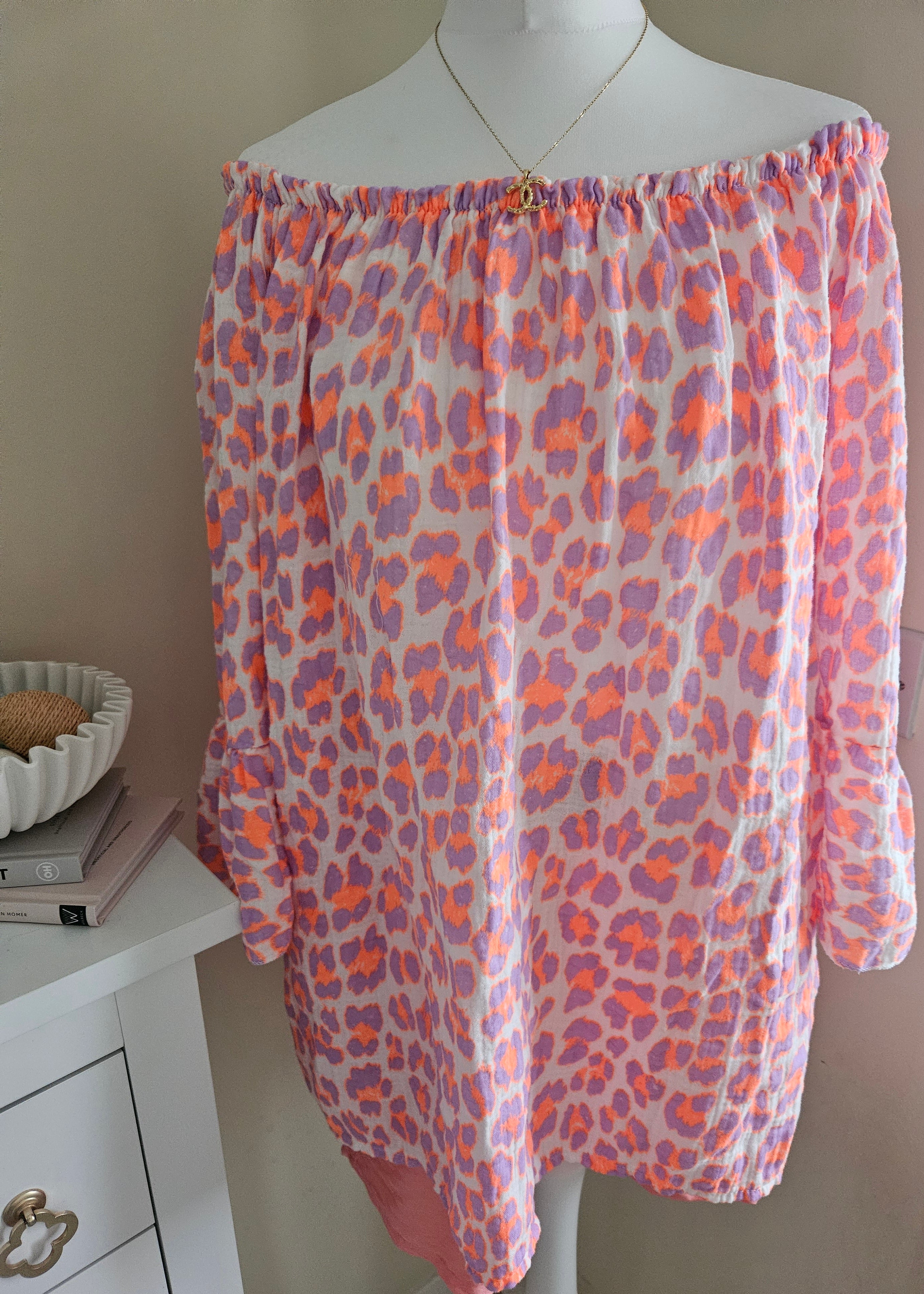 The Amira leopard print off the shoulder top purple and orange