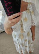 Eleni white and gold dip hem dress