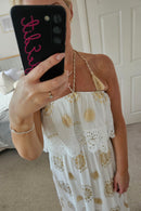Eleni white and gold dip hem dress